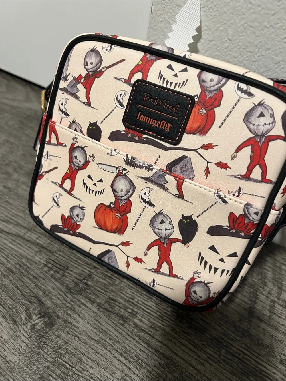 Loungefly Cream Crossbody Bag with Red Halloween Character Print